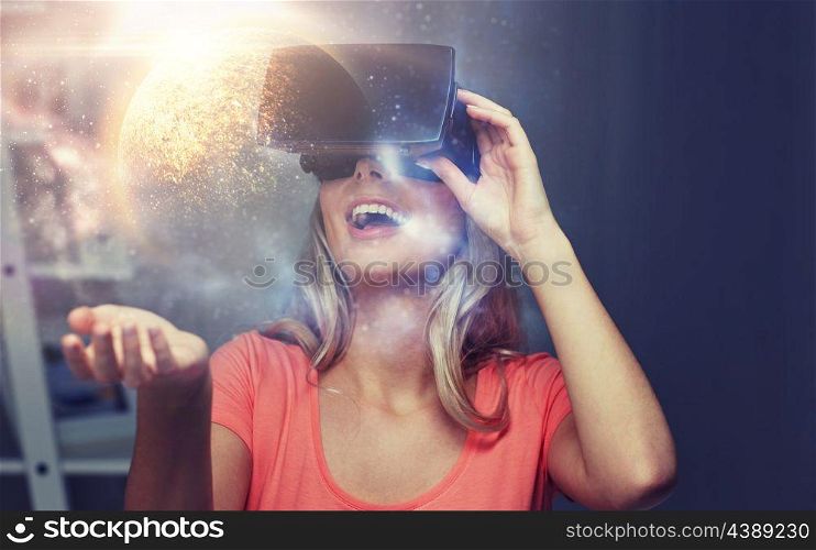 technology, augmented reality and people concept - happy young woman with virtual headset or 3d glasses over planet and space background. woman in virtual reality headset or 3d glasses. woman in virtual reality headset or 3d glasses