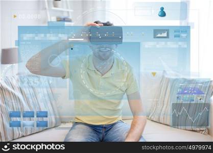 technology, augmented reality, big data and people concept - happy young man with virtual headset or 3d glasses looking at screens projection. young man in virtual reality headset or 3d glasses
