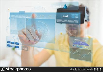 technology, augmented reality, big data and people concept - young man with virtual headset or 3d glasses touching screens projection. young man in virtual reality headset or 3d glasses