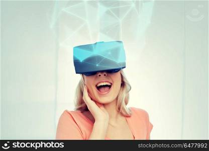 technology, augmented reality, cyberspace, entertainment and people concept - happy amazed young woman with headset or 3d glasses looking at virtual projection of low poly shape. woman in virtual reality headset or 3d glasses. woman in virtual reality headset or 3d glasses