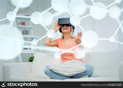 technology, augmented reality, entertainment and people concept - happy young woman in virtual headset or 3d glasses and headphones at home looking at projection of molecule