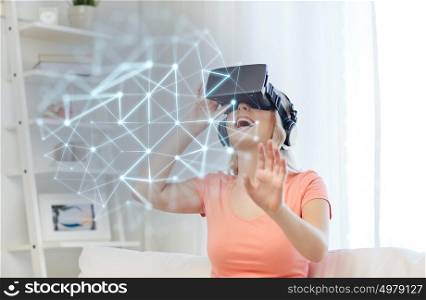 technology, augmented reality, entertainment and people concept - happy young woman in virtual headset or 3d glasses and headphones playing game at home and low poly projection. woman in virtual reality headset or 3d glasses