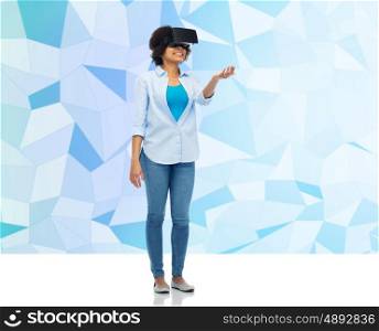 technology, augmented reality, entertainment and people concept - happy young woman with virtual headset or 3d glasses over blue low poly background