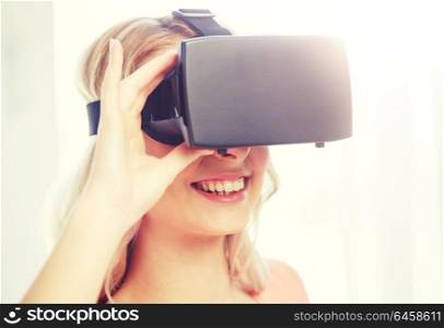technology, augmented reality, entertainment and people concept - happy young woman with virtual reality headset or 3d glasses. woman in virtual reality headset or 3d glasses