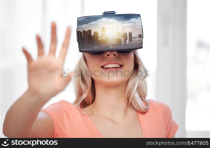 technology, augmented reality, entertainment and people concept - happy young woman with virtual headset or 3d glasses playing video game with singapore city on screen. woman in virtual reality headset or 3d glasses. woman in virtual reality headset or 3d glasses