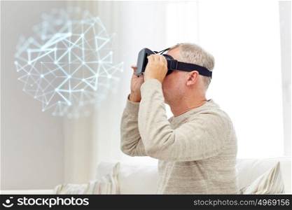 technology, augmented reality, gaming, entertainment and people concept - senior man in virtual headset or 3d glasses with low poly projection at home. old man in virtual reality headset or 3d glasses