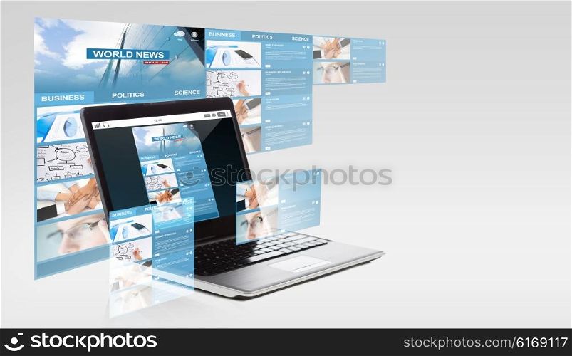 technology, business and mass media concept - laptop computer with world news on screen