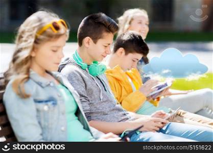 technology, cloud computing and people concept - happy teenage boy with tablet pc computer and headphones outdoors. happy teenage boy with tablet pc and headphones