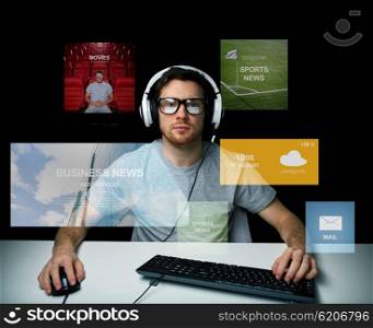 technology, communication, mass media, virtual reality and people concept - young man in headset and eyeglasses with pc computer keyboard over virtual screens