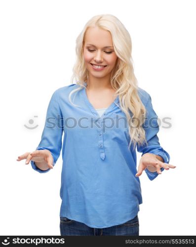 technology concept - attractive young woman in casual clothes working with virtual screen