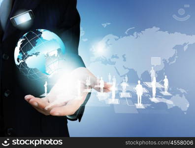 Technology concept. Image of business person holding devices in hands