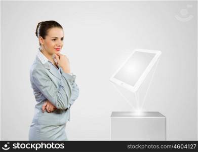 Technology concept. Image of businesswoman and white tablet pc. New technologies