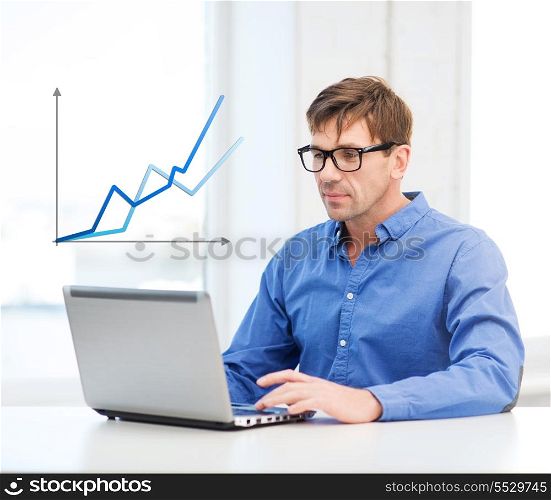 technology, economy, business and office concept - man in eyeglasses working with laptop at home