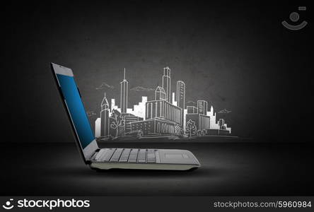 technology, electronics and advertisement concept - open laptop computer with blank screen and city sketch over dark gray background