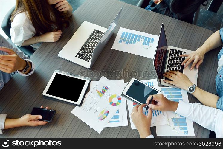 Technology equipment with tablet, laptop, business documents on meeting table. Technology equipment with tablet, laptop, business documents on