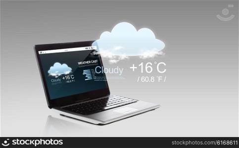 technology, forecast and meteorology concept - laptop computer with weather cast on screen