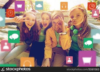 technology, friendship and people concept - happy teenage friends or high school students having fun and making faces with menu icon. happy teenage students or friends having fun