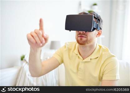 technology, gaming, entertainment and people concept - young man with virtual reality headset or 3d glasses playing video game