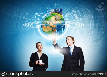 Technology innovations. Businessman and businesswoman touching icon of digital screen. Elements of this image are furnished by NASA