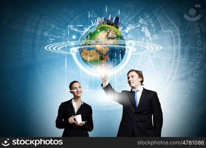 Technology innovations. Businessman and businesswoman touching icon of digital screen. Elements of this image are furnished by NASA