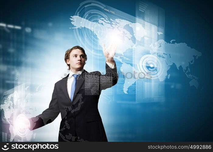 Technology innovations. Businessman in suit touching icon of media screen