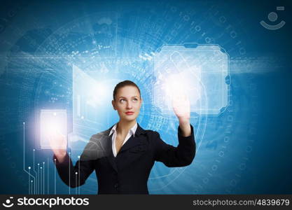 Technology innovations. Young attractive businesswoman touching icon of digital screen