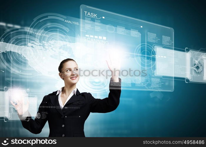 Technology innovations. Young attractive businesswoman touching icon of digital screen