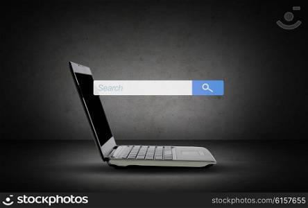 technology, internet and advertisement concept - laptop computer with web search browser bar on screen over gray background