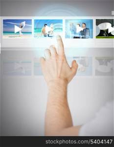 technology, internet and networking concept - man pressing button on virtual screen