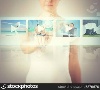 technology, internet and networking concept - woman pressing button on virtual screen