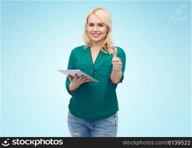 technology, internet and people concept concept - smiling woman with tablet pc computer showing thumbs up over blue background