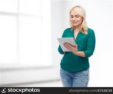 technology, internet and people concept concept - smiling woman with tablet pc computer over white room background