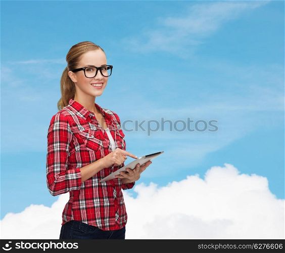 technology, internet and people concept - smiling girl in eyeglasses with tablet pc computer
