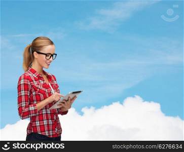technology, internet and people concept - smiling girl in eyeglasses with tablet pc computer