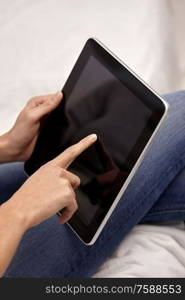 technology, internet, communication and people concept - close up of young woman with tablet computer. close up of young woman with tablet computer