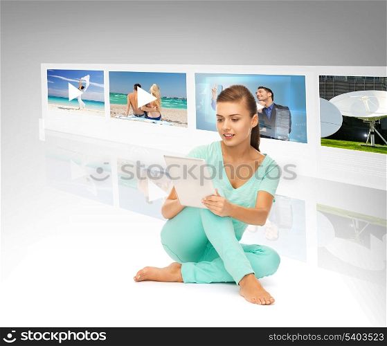 technology, internet, tv and news concept - young woman with tablet pc and virtual screens