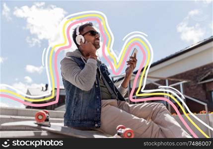technology, leisure and people concept - indian man with smartphone, headphones and longboard listening to music on roof top with glowing lines. man with smartphone and headphones on roof top