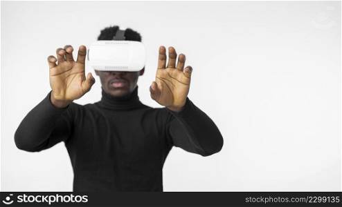 technology man using virtual reality headset front view