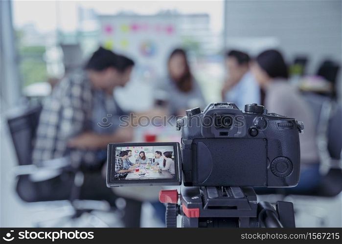 Technology Meeting Tele Conference by video equipment modern camera make digital media. People business digital television production focus on camera with conference meeting shot.