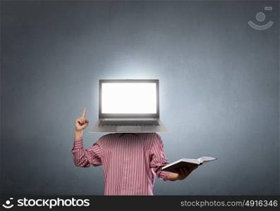 Technology mind. Businessman with laptop instead of his head