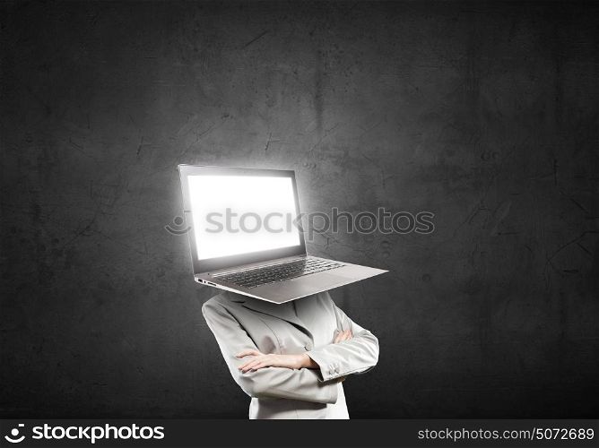 Technology mind. Businesswoman with laptop instead of his head