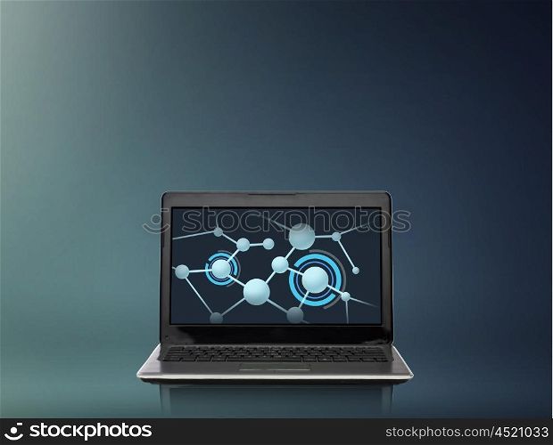 technology, network, science and internet concept - laptop computer with molecules structure on screen over gray background