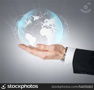 technology, news and environment concept - man hand holding virtual sphere globe