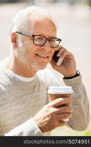 technology, people, lifestyle and communication concept - happy senior man calling on smartphone in city. happy senior man calling on smartphone in city