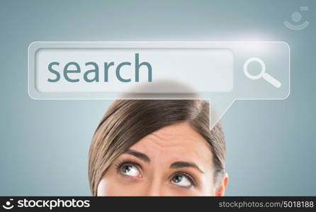 Technology, searching system and internet concept - woman looking at Search engine button overhead