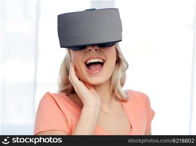 technology, virtual reality, cyberspace, entertainment and people concept - happy amazed young woman with virtual reality headset or 3d glasses at home