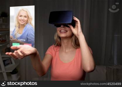technology, virtual reality, cyberspace, entertainment and people concept - happy young woman with virtual reality headset or 3d glasses at home looking at incoming call projection