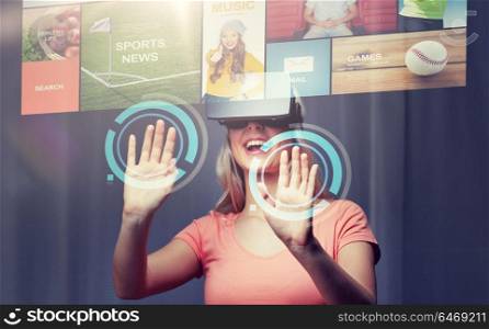 technology, virtual reality, cyberspace, entertainment and people concept - happy young woman with virtual reality headset or 3d glasses at home looking at news projection. woman in virtual reality headset or 3d glasses