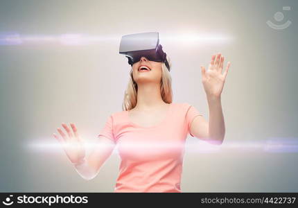 technology, virtual reality, entertainment and people concept - happy young woman with virtual reality headset or 3d glasses over gray background and laser light