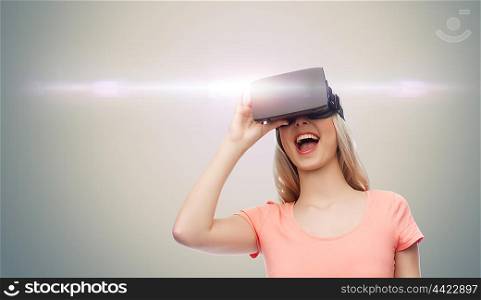 technology, virtual reality, entertainment and people concept - happy young woman with virtual reality headset or 3d glasses over gray background and laser light